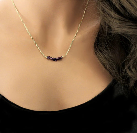 A mannequin torso wearing a gold filled cable chain necklace with a 1 inch gemstone bar made from natural amethyst chips.