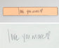 A handwritten message in distinct handwriting is shown next to a rendering of a rose gold bar that has been engraved with the same message in the same distinct handwriting.