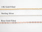 Three metal finishes offered by Gilded Sapphire's custom and handmade jewelry including 14 carat gold filled, sterling silver, and rose gold filled chain.